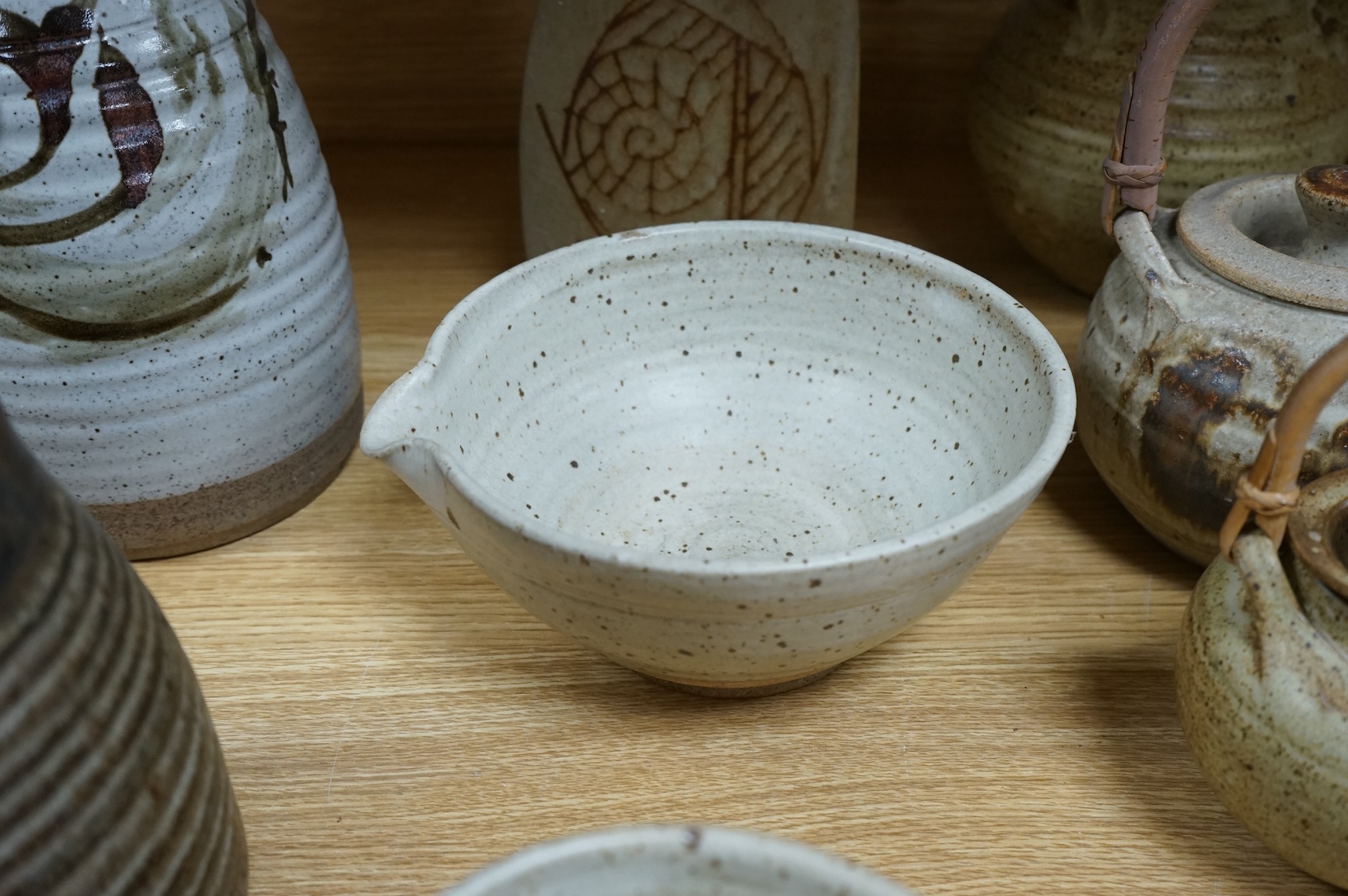 A collection of large Studio pottery vases teapots bowls and tureens (12). Tallest 27cm high